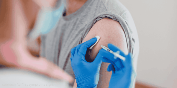 stomach flu first symptoms signs